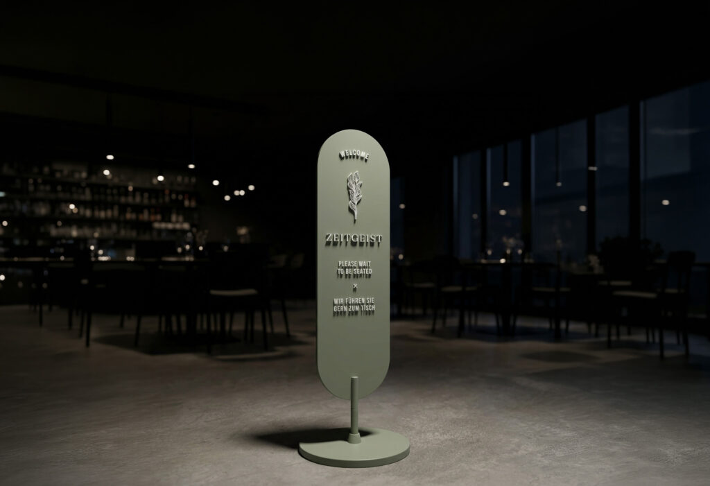 Eingangsschild für das Café Zeitgeist mit Logo und Beschriftung